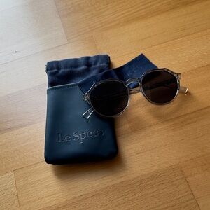 Le Specs Transparent Round Sunglasses with Navy Case